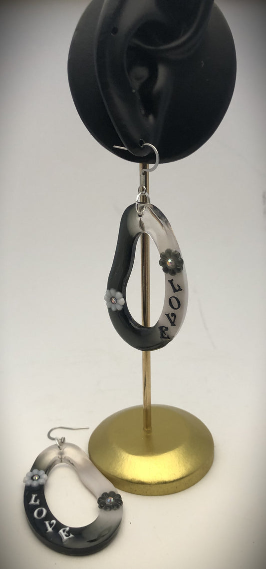 Boucles en contraste de noir et blanc